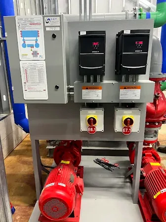 Industrial pump station with E6.1 and E7.1 lockout points and ECT control panel, the multi-energy-source equipment found across Chicago food processing, fabrication, and chemical facilities